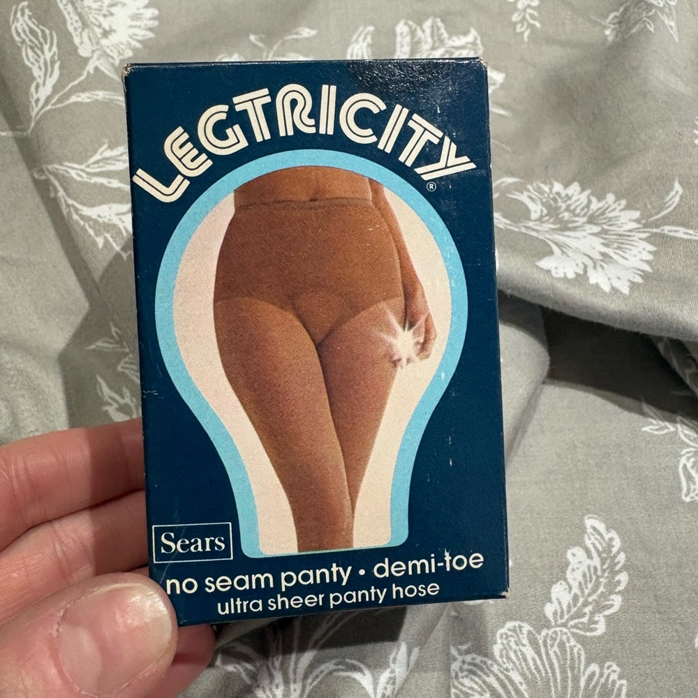 Vintage Sears Legtricity pantyhose display bathroom